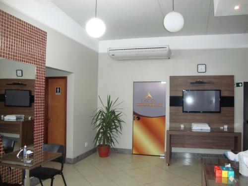TV a/nebo společenská místnost v ubytování Hotel Golden JK