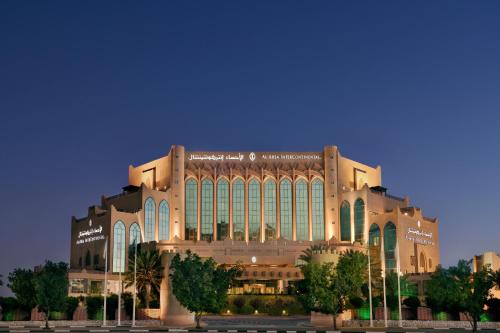 a large building with a lot of windows at Al Ahsa InterContinental by IHG in Al Ahsa