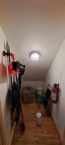 a attic room with a room with a ceiling at Lochaber Homesteader Lodge in Antigonish