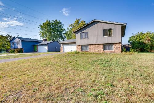 a house with a large yard in front of it at Spacious Family Home 11 Mi to Dtwn Minneapolis! in Minneapolis