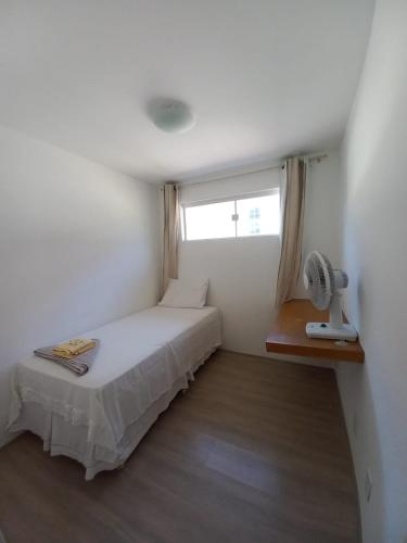 Un pat sau paturi într-o cameră la Solar da Barra