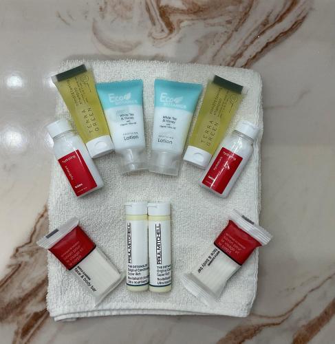 a group of four products sitting on a table at Budget Host Inn in Buffalo