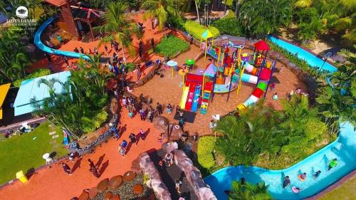 an aerial view of a water park with a playground at Lotus Desaru Beach Resort, 2 bdrms, w/splash park in Bandar Penawar
