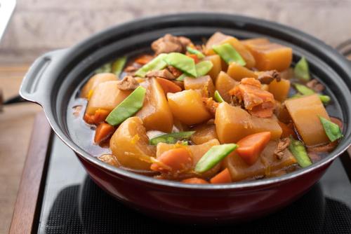 a bowl of food with meat and vegetables at Super Hotel Tokyo JR Tachikawa Kitaguchi in Tachikawa