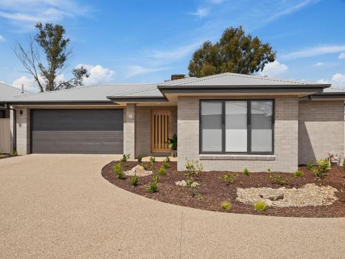 a rendering of a house with a garage at Rosella Retreat in Yarrawonga