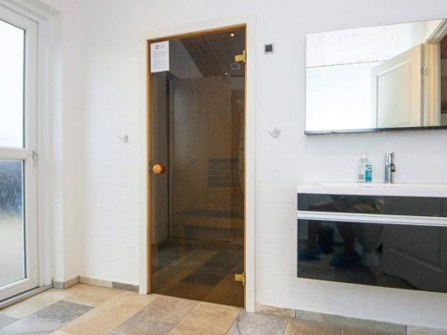 a bathroom with a shower and a sink at 16 person holiday home in Ansager-By Traum in Ansager