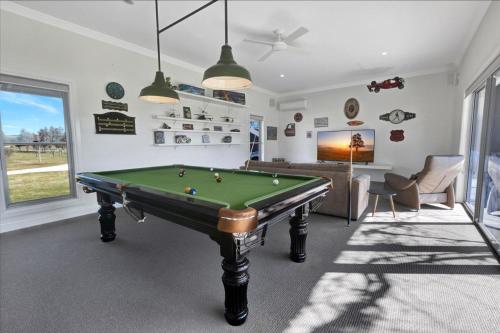 a living room with a pool table in it at The AUSF Homestead in Sale