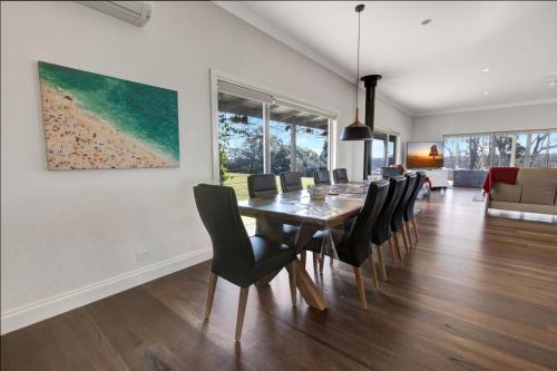 a dining room with a table and chairs at The AUSF Homestead in Sale