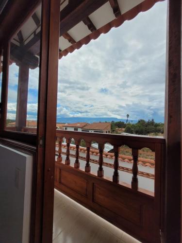 a view from a balcony with a view of the desert at HOTEL ALTIPLANO VILLA DE LEYVA in Villa de Leyva