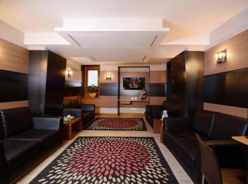 Uma área de estar em Hotel Trevi - Gruppo Trevi Hotels