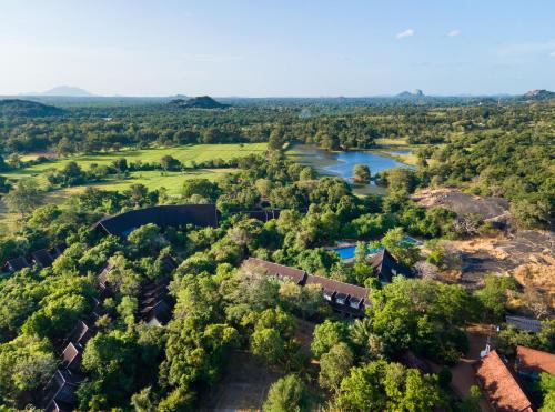 an aerial view of a subdivision with a river at Occidental Paradise Dambulla in Sigiriya