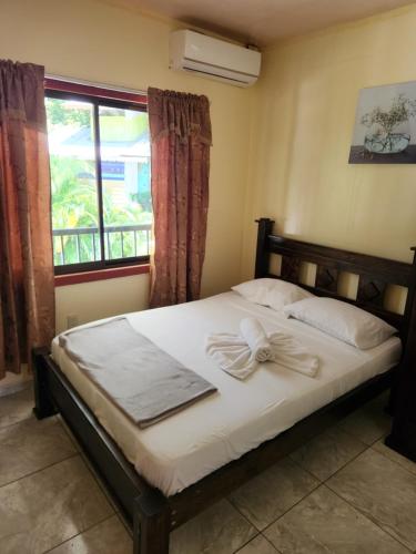 Postel nebo postele na pokoji v ubytování Family Hotel