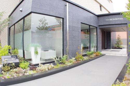a rendering of the front of a building at 笠岡　潮待ちHOTEL in Fushigoe