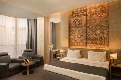 Postel nebo postele na pokoji v ubytování Republica Hotel Yerevan
