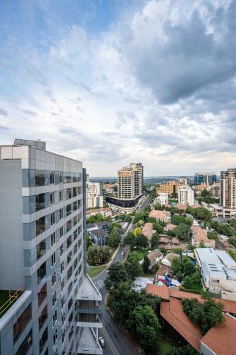 an aerial view of a city with buildings at Spacious 2BR APT Near Sandton City -No Loadshedding in Johannesburg