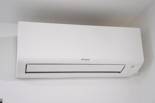 a microwave oven sitting on top of a wall at XANTHI POLIS CITY CENTER with private parking in Xanthi