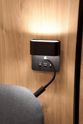 a electrical outlet with a wire plugged into a wall at XANTHI POLIS CITY CENTER with private parking in Xanthi