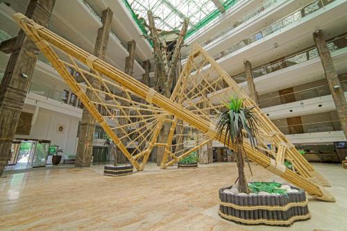 a large exhibit in a building with a slide at Holiday World Polynesia in Benalmádena