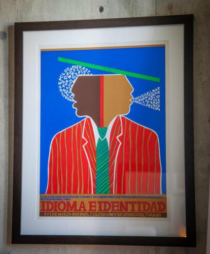 a framed poster of a man in a suit at Dream Inn PR in San Juan