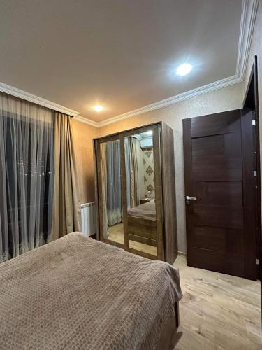 Llit o llits en una habitació de Ananiko