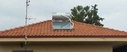 an air conditioner on the roof of a house at ''Mary's House'' Entire residence Olympiada Halkidiki Near to Sea 200m ! in Olympiada