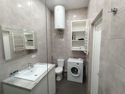 Ένα μπάνιο στο Apartments Bis House