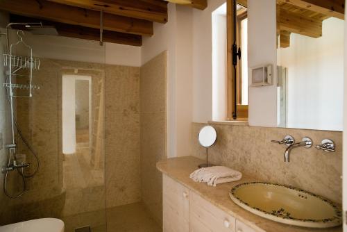 a bathroom with a sink and a shower at Modus Vivendi Holidays Arsos in Arsos
