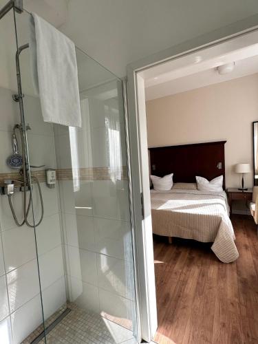 Ένα ή περισσότερα κρεβάτια σε δωμάτιο στο Park Apart Hotel Gatower Str.
