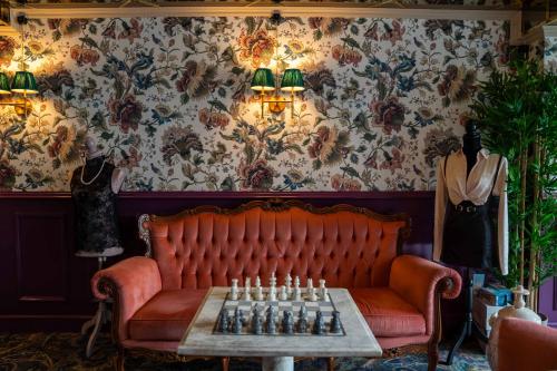 Ruang duduk di Charmante - Skostredet Hôtel