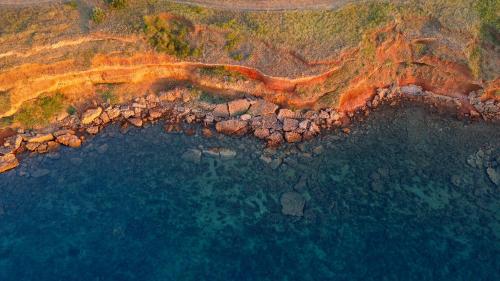 an aerial view of a body of water at Number One Apartments in Vir