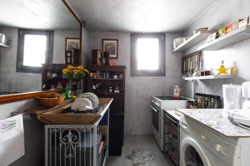 a kitchen with a sink and a dishwasher at Best Located Melina Escape in Kalamata