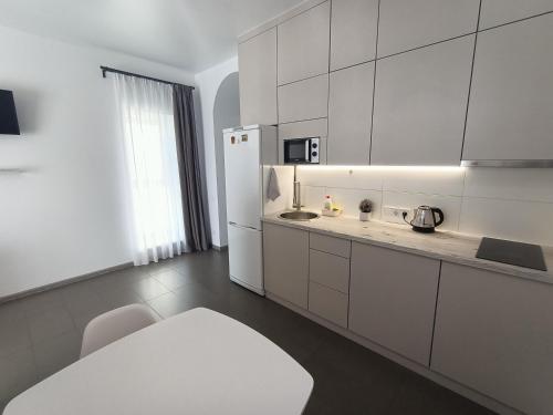 Η κουζίνα ή μικρή κουζίνα στο Apartments Bis House