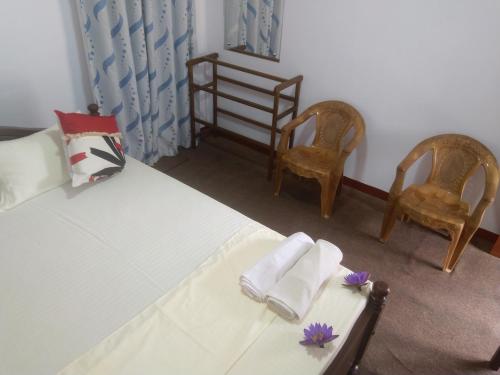 Voodi või voodid majutusasutuse Nethusaliguesthouse toas