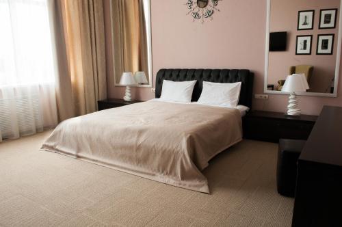 Cama o camas de una habitación en Koltso Hotel