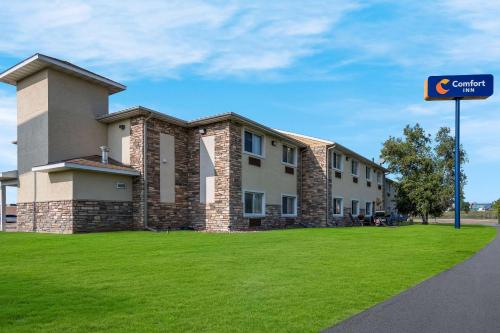 a building with a sign in front of it at Comfort Inn Onalaska - La Crosse Area in Onalaska