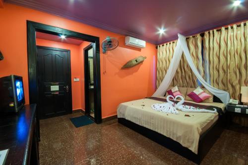 Katil atau katil-katil dalam bilik di Golden Butterfly Villa