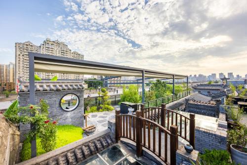 a view from the balcony of a building at Honglu Garden Hotel Bell and Drum Tower Huimin Street Store & 2 bottles of beer for free in Xi'an