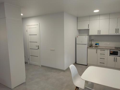 Η κουζίνα ή μικρή κουζίνα στο Apartments Bis House