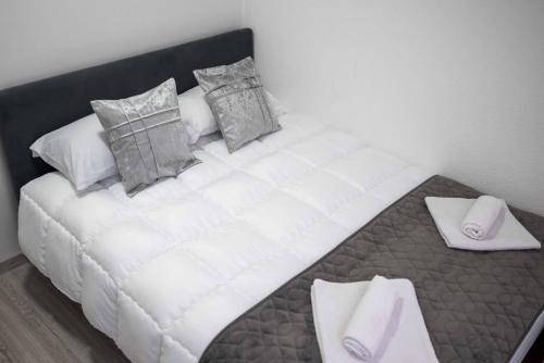 Postel nebo postele na pokoji v ubytování The Sun Apartments Brcko