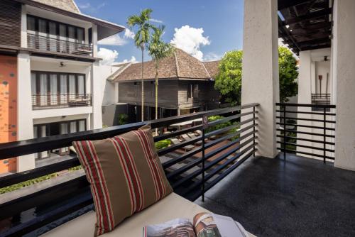 Un balcón o terraza de U Chiang Mai