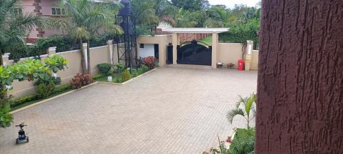 an aerial view of a house with a driveway at Cosy Living in Gulu