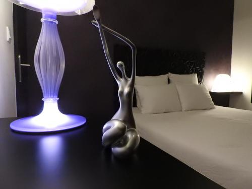 Postel nebo postele na pokoji v ubytování Escapade Coquine