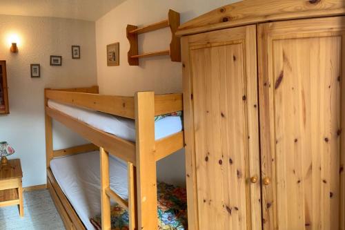 Ένα ή περισσότερα κρεβάτια σε δωμάτιο στο Résidence Atrey 205 Clés Blanches Courchevel