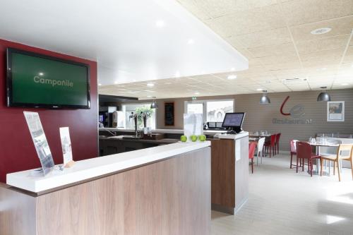 Телевизор и/или развлекательный центр в Campanile Créteil - Bonneuil Sur Marne