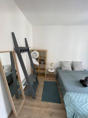 Ein Sitzbereich in der Unterkunft Cosy 2BR near Paris & Stade de France