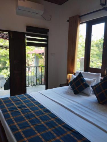 Ένα ή περισσότερα κρεβάτια σε δωμάτιο στο Sinali Villa