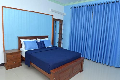 Postel nebo postele na pokoji v ubytování Sri Ra'anana Villa