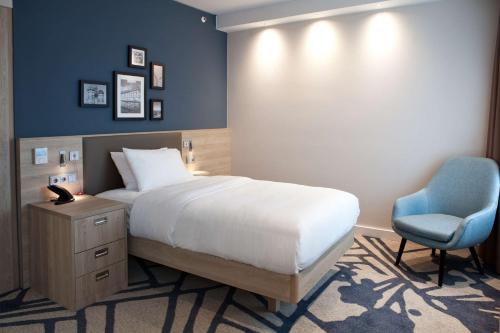 Postel nebo postele na pokoji v ubytování Hampton By Hilton Munich City Center East
