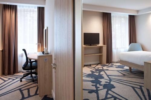 Postel nebo postele na pokoji v ubytování Hampton By Hilton Munich City Center East