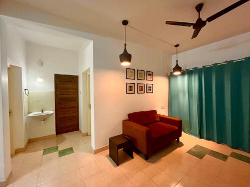Ένα ή περισσότερα κρεβάτια σε δωμάτιο στο Anjali Apartments